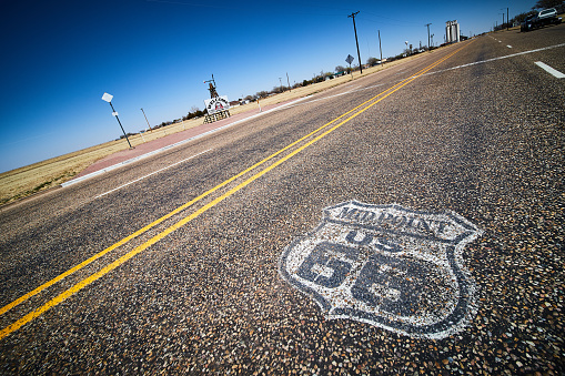 Famous US Route 66 sign along highway in New Mexico