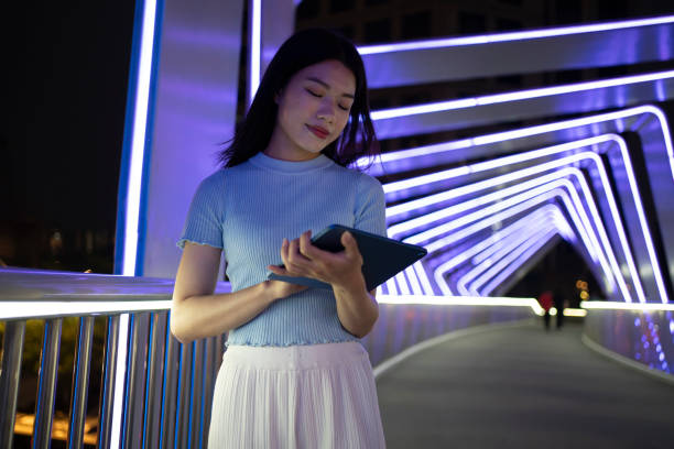istock Beautiful Women Working on Tablets on Bridges 1491044312