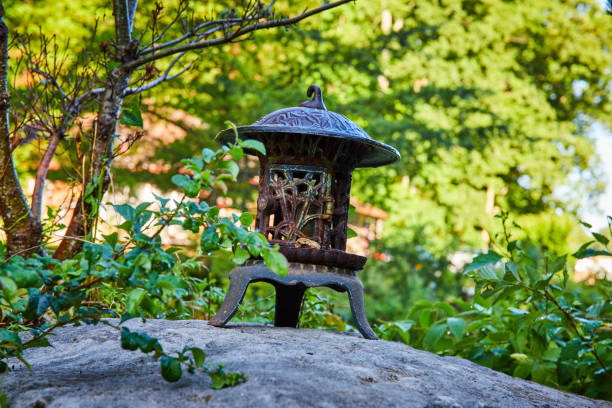 Image of Small metal lantern in Tibetan Mongolian Buddhist forest shrine