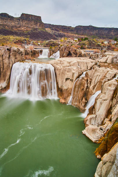istock Spring waters at Shoshone Falls in Idaho with tan rocks 1491046031
