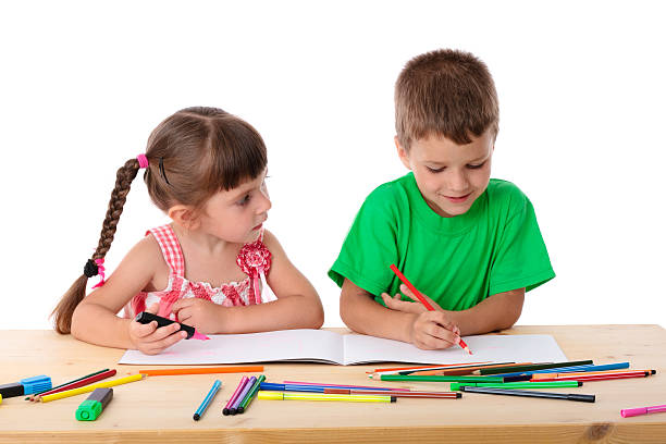 istock Two little kids draw with crayons 149104762
