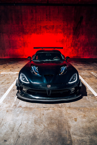 Seattle, WA, USA
May 17, 2023
Dodge Viper in black parked showing the front of the car with the brake lights on