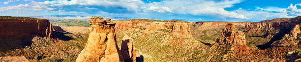 istock Panorama of large canyon with rocky pillars in desert 1491051008