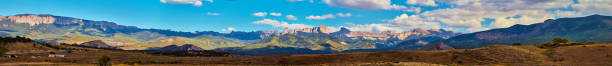 istock Panorama of vast valley with beautiful mountains in background 1491051090