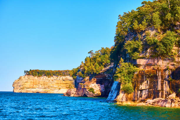 istock Pictured Rocks coastal shot of distant face rock 1491051519