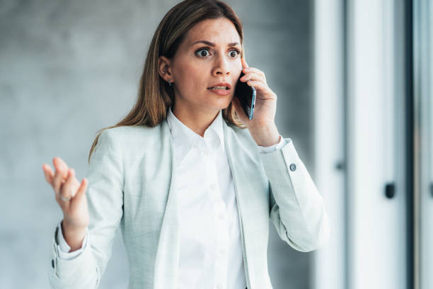 istock Business woman talking on the phone 1491051649