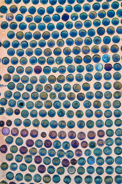 istock Wall of glass bottles for unique housing material 1491054606