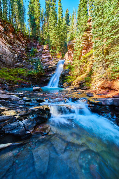 istock Waterfalls in colorful canyon with sunlight 1491054694