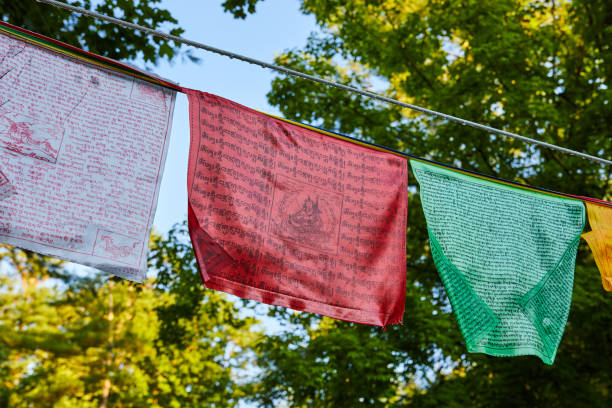istock White, red, and green Tibetan Mongolian Buddhist prayer flags on rope 1491055555