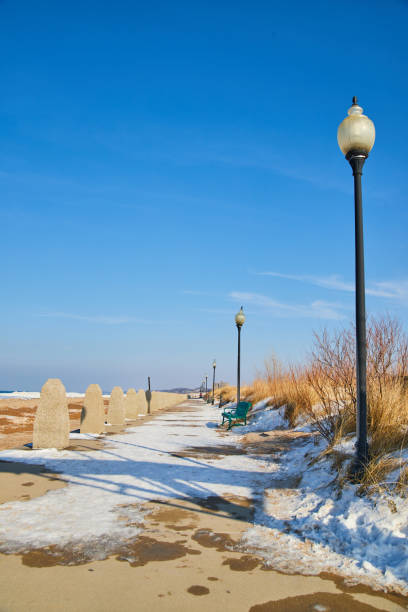 istock Winter walkway with snow and sand dunes 1491055714