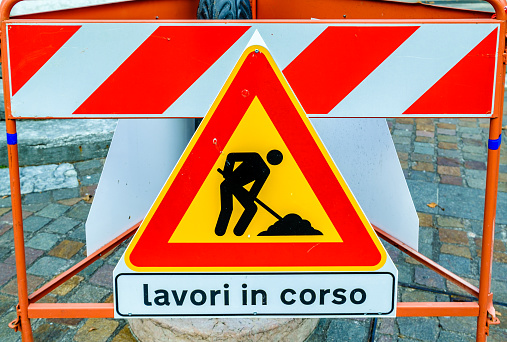 men at work sign in italy - photo - translation: construction site