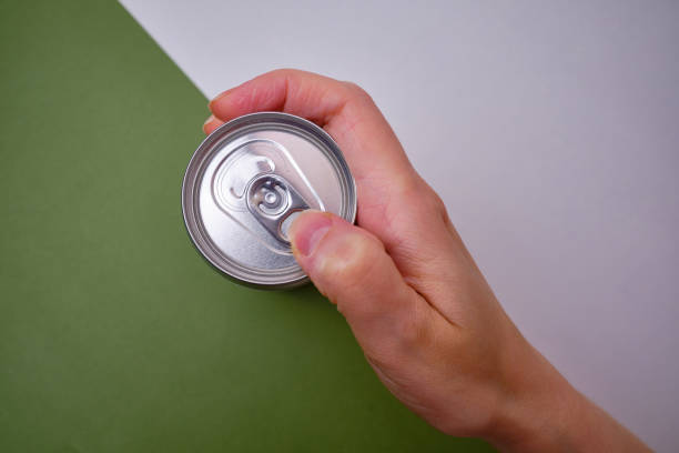 istock Empty soda can, focus on drink on light background. Place for text and information 1491057585