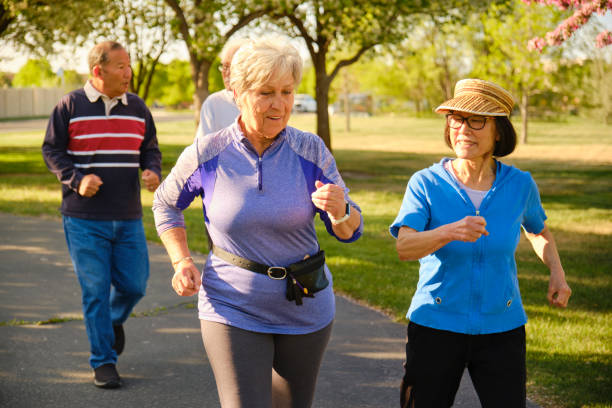 istock Group of Senior Aged People Power Walking in a Park 1491063680