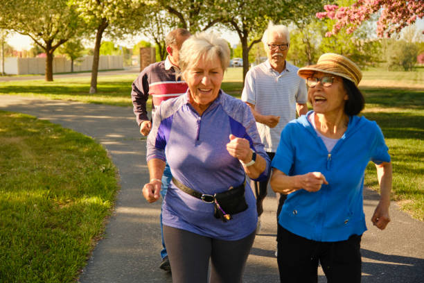 istock Group of Senior Aged People Power Walking in a Park 1491063696