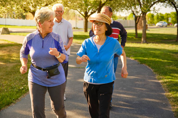 istock Group of Senior Aged People Power Walking in a Park 1491063712
