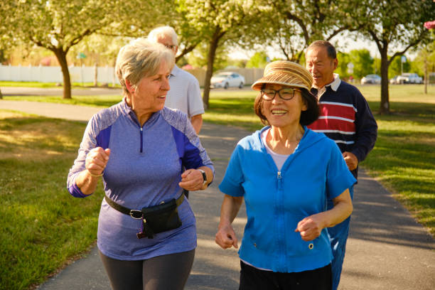 istock Group of Senior Aged People Power Walking in a Park 1491063754