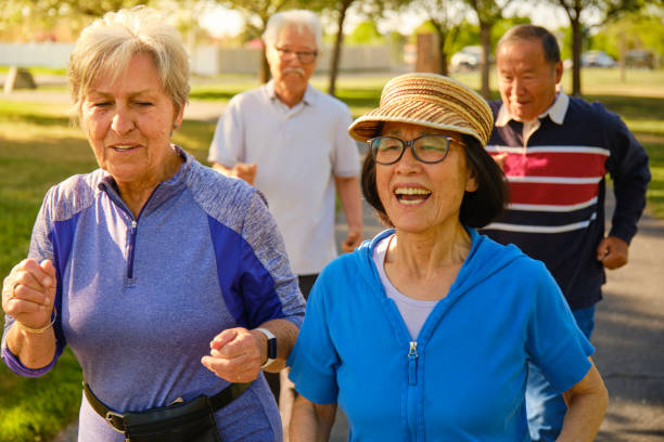 istock Group of Senior Aged People Power Walking in a Park 1491063774