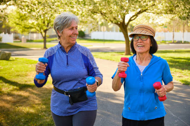 istock Senior Aged Women Power Walking in a Park 1491064126