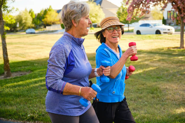 istock Senior Aged Women Power Walking in a Park 1491064563