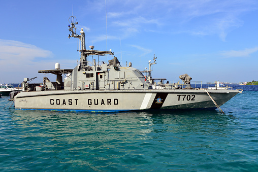 Amalfi Coast, Italy - June 28, 2014: Big Yacht and Coast Guard Boat Patrolling at Tyrrhenian Sea in Amalfi Coast, Italy.