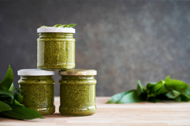 istock Preserved wild garlic pesto with copy space 1491069381