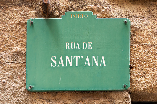 street name rua de sant Ana - engl -street of holy Anna on old traditional tiles in Porto