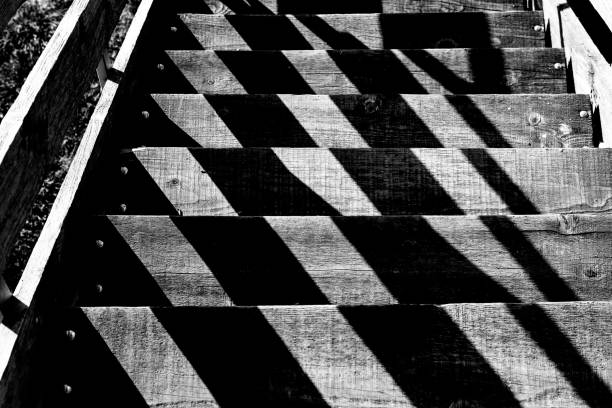 Shadow pattern on wooden stairs
