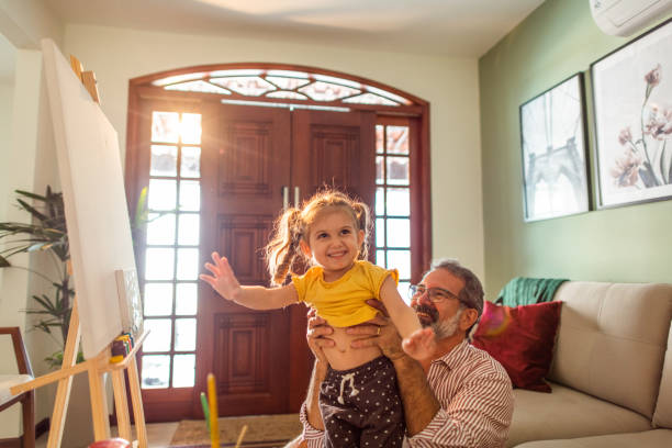 istock Generational artistry: grandpa and granddaughter's creative journey 1491090642