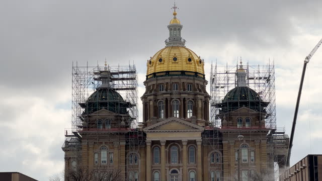 Close Shot of the Golden Rotunda of the Iowa State Capitol (Under Construction) under a Cloudy Sky