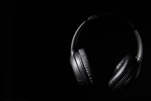 istock Headphones still life shot on a black background. 1491094522