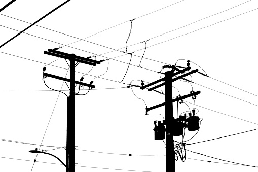 Silhouette of electricity pylons and power lines
