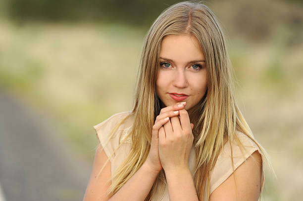 istock Pretty Blond Girl with Warm Gaze 149110174