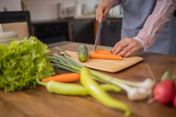 istock Young woman is preparing a meal 1491103238