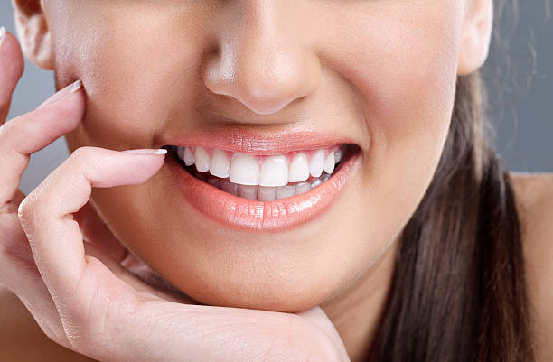 istock beautiful  young woman with great smile 149110480