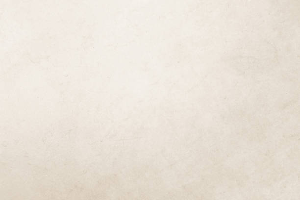istock Colour old concrete wall texture background. Close Up retro plain cream color cement wall background texture. Design paper vintage parchment element show or advertise or promote product on display. 1491105000