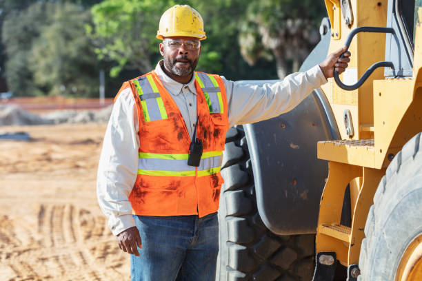 istock African-American construction worker next to vehicle 1491120432