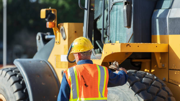 istock Hispanic man at construction site, walking by vehicle 1491120497