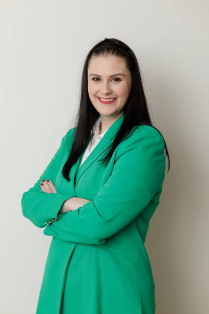 istock Smiling businesswoman with arms folded 1491123905