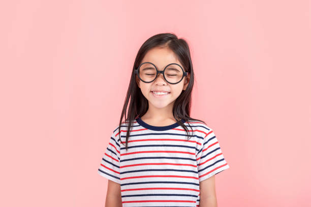 istock little girl on pink background 1491127659