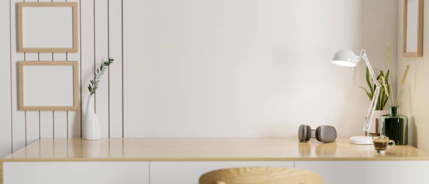 istock Copy space for product display on a minimal wood table with decor against the white wall. 1491129762