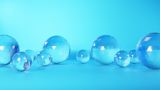 3D Illustration.Transparent glass sphere floating in midair on light blue background. (Horizontal)
