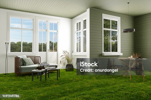 istock Surreal Living Room Interior With Armchair, Wooden Table, Chairs And Grass Flooring 1491149786