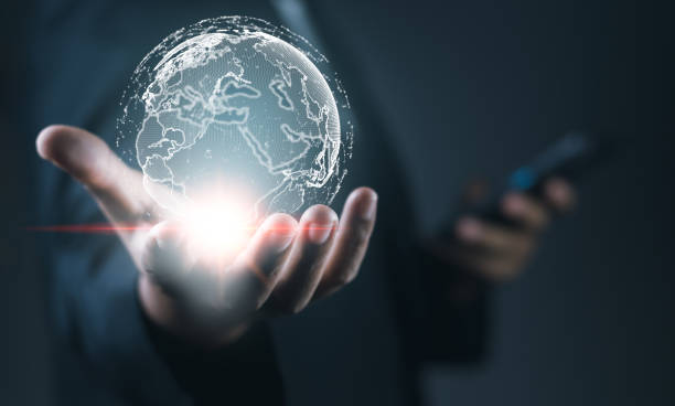 istock Global communication network concept. Businessman holding global network connection on social networking and customer data analytics. Development goals. Marketing, Technology and global business. 1491154177