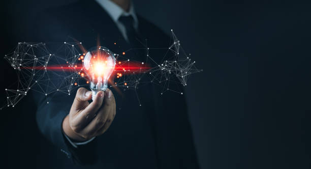 istock Creative thinking ideas and innovation technology,inspiration concept. Businessman holding light bulbwith virtual brain inside,Idea and imagination,Solution analysis and development network connection 1491154556