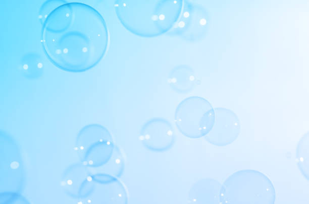 istock Beautiful Blurred Transparent Blue Soap Bubbles. Abstract Background. Defocused White Space. Celebration Festive Backdrop. Freshness Soap Suds Bubbles Water 1491156367