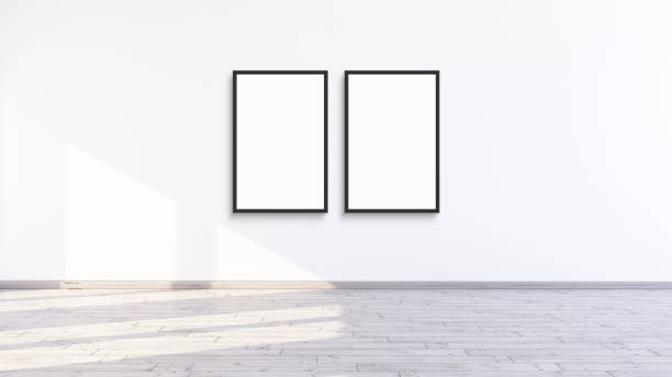 istock Two empty, vertical, modern, black frame mock up in a white room, 3d illustration of a white wall interior render 1491159473