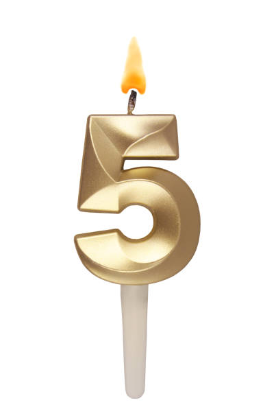 istock Gold birthday candle isolated on white. Number 5. 1491160828