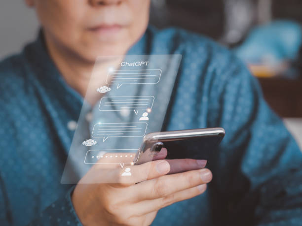 istock Businessman using technology smart robot AI, digital ai chatbot, on smartphone. A.I., system artificial intelligence on virtual screen. 1491162599