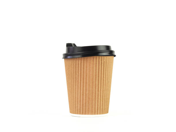 istock Brown disposable paper coffee mug with lid isolated on a white background. 1491163543