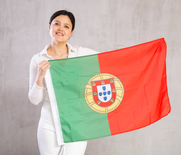 istock Young woman posing in studio with Portugal flag 1491164430